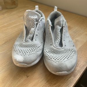 White APL tennis shoes